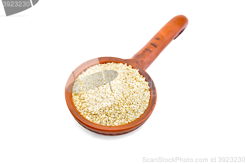 Image of Sesame seeds in dipper
