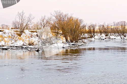 Image of River and the snow-covered beach with trees