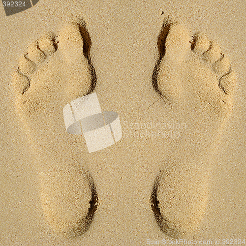 Image of Footprint in sand on beach