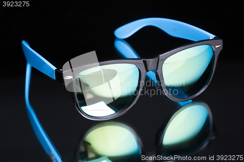 Image of colored sunglasses.