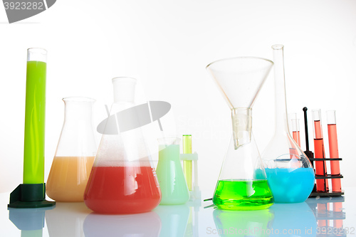 Image of Test-tubes with liquid on light background