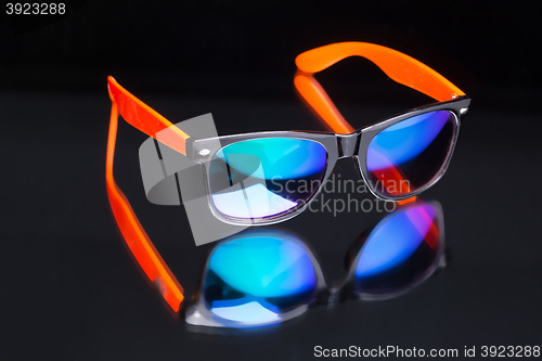 Image of colored sunglasses.