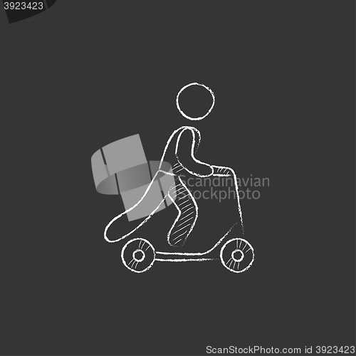 Image of Man riding kick scooter. Drawn in chalk icon.