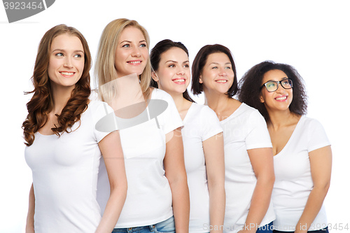 Image of group of happy different women in white t-shirts