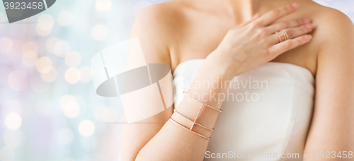 Image of close up of beautiful woman with ring and bracelet