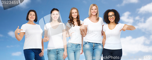 Image of group of happy different women in white t-shirts