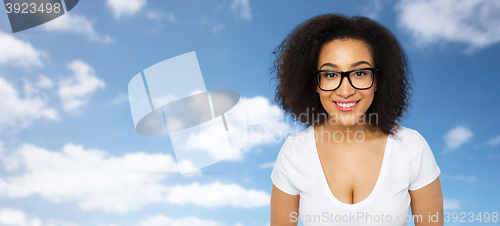 Image of happy african woman or student girl in eyeglasses