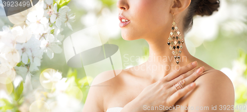 Image of close up of beautiful woman with earrings