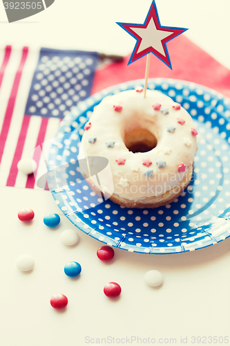 Image of donut with star decoration on independence day