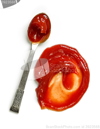 Image of tomato ketchup and spoon