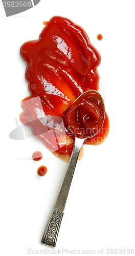 Image of tomato ketchup and spoon