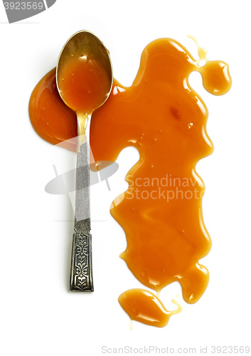 Image of caramel sauce on white background