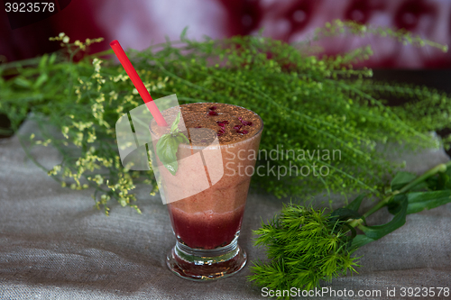 Image of raspberry smoothie with basil