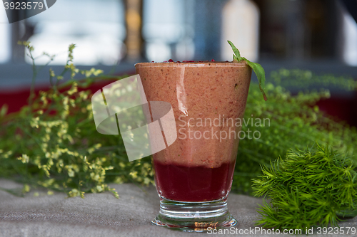 Image of raspberry smoothie with basil