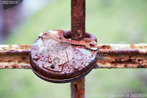 Image of old rusty iron padlock