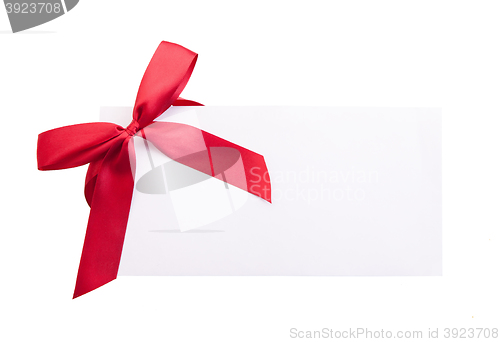 Image of Card note with red ribbon on white background