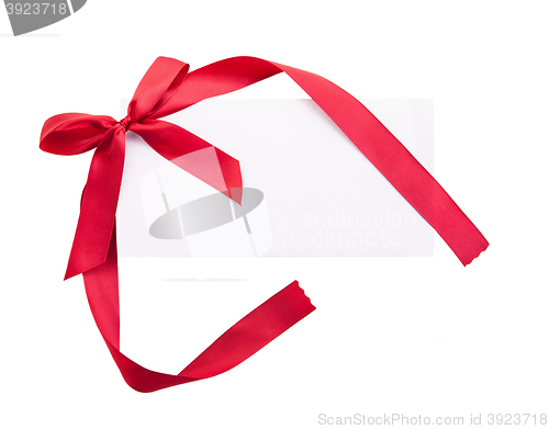 Image of Card note with red ribbon on white background