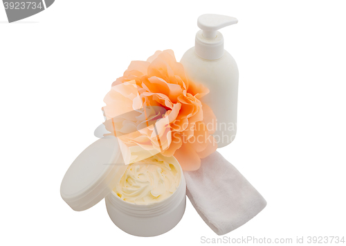 Image of Spa cosmetic creams and flower isolated on white