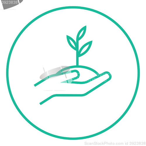 Image of Hands holding seedling in soil line icon.