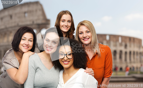 Image of group of happy different women over coliseum
