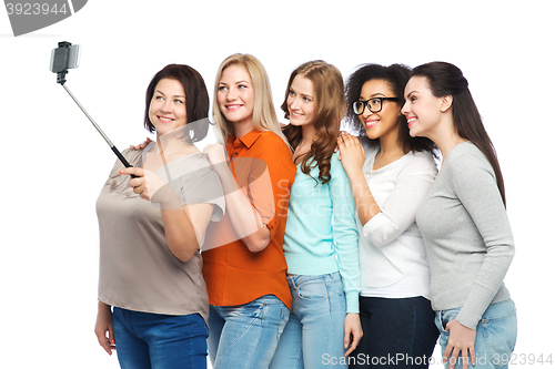 Image of group of happy taking selfie by smartphoone
