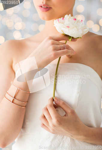 Image of close up of beautiful woman with ring and bracelet