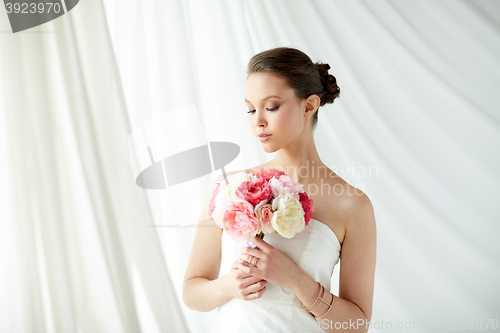 Image of beautiful asian woman with flower and jewelry