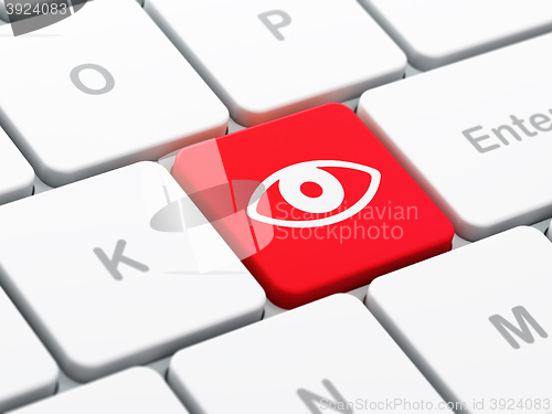 Image of Security concept: Eye on computer keyboard background