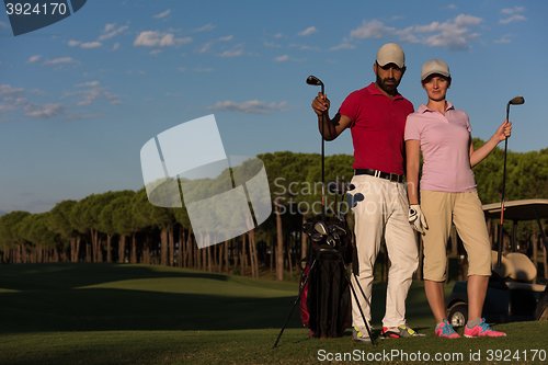 Image of portrait of couple on golf course