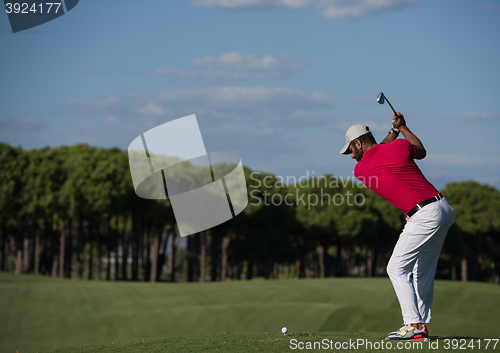 Image of golf player hitting long shot