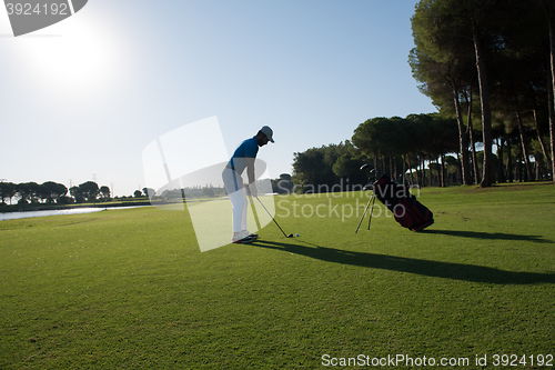 Image of golf player hitting shot