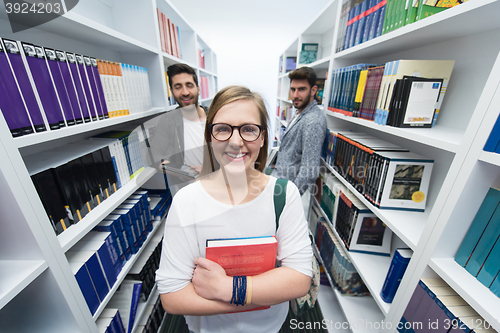 Image of students group  in school  library