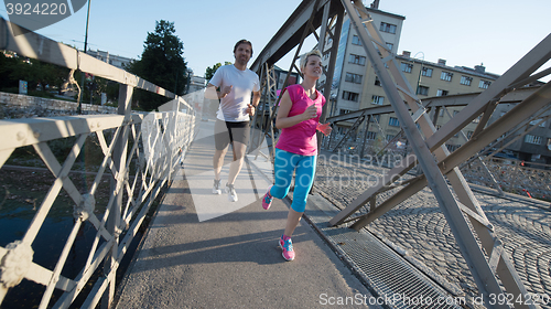 Image of couple jogging