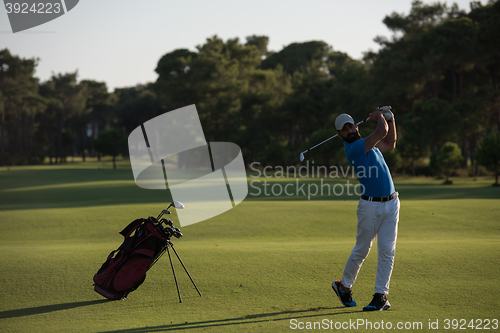 Image of golfer hitting long shot