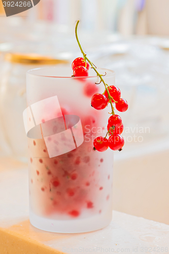 Image of Fresh red currants in frosted glass
