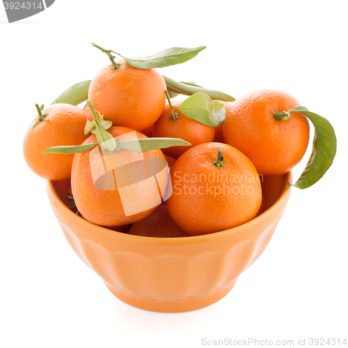 Image of Tangerines on ceramic orange bowl 