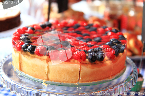 Image of raspberries and blueberries cake