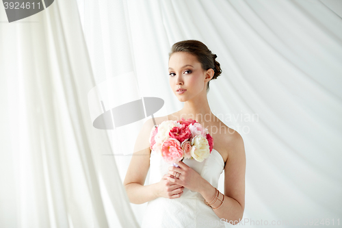 Image of beautiful asian woman with flower and jewelry