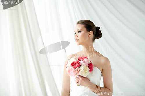 Image of beautiful asian woman with flower and jewelry