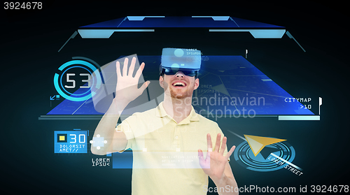 Image of happy man in virtual reality headset or 3d glasses