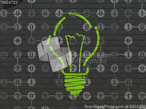Image of Business concept: Light Bulb on wall background