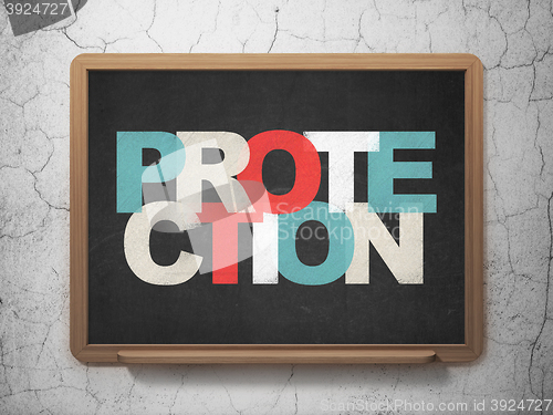 Image of Safety concept: Protection on School board background
