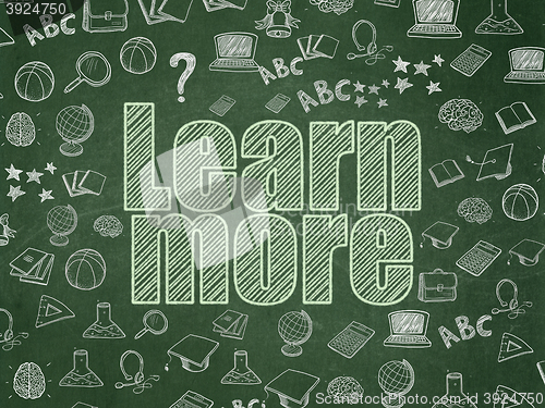 Image of Learning concept: Learn More on School board background