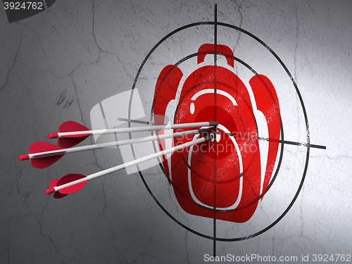 Image of Travel concept: arrows in Backpack target on wall background