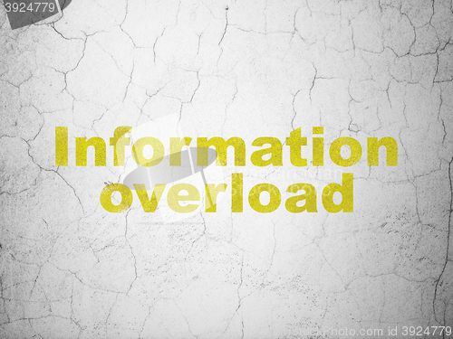 Image of Information concept: Information Overload on wall background