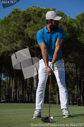 Image of golf player hitting shot