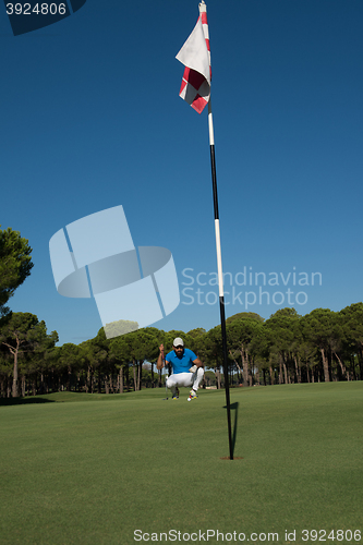 Image of golf player aiming perfect  shot