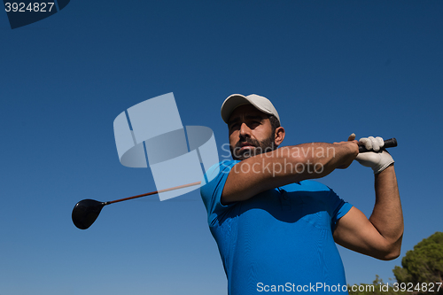 Image of golf player hitting shot
