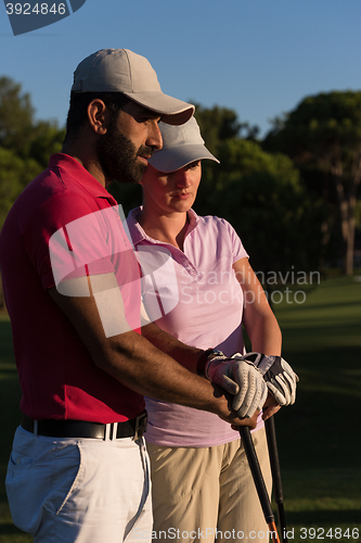 Image of portrait of couple on golf course
