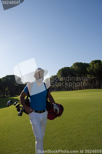 Image of golf player walking